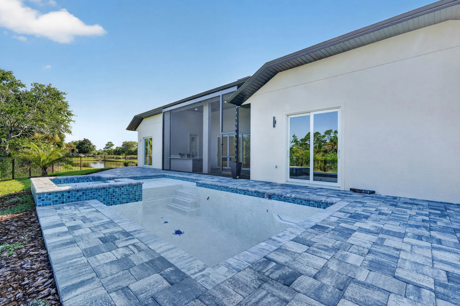 The Anna Marie model by Wise Choice Custom Homes, pool and patio